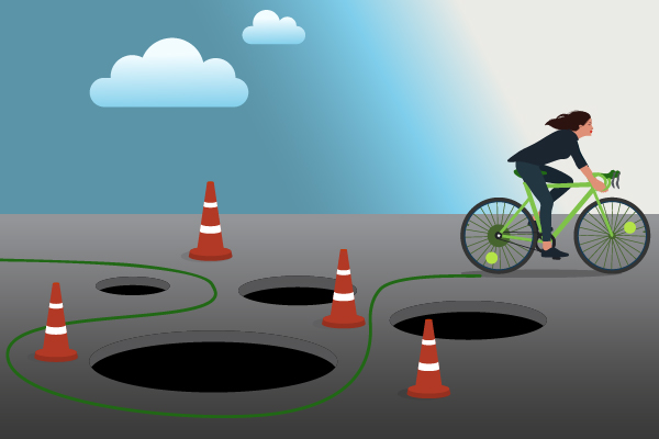 A firm owner avoids pitfalls in the road of a software's implementation process on her bike